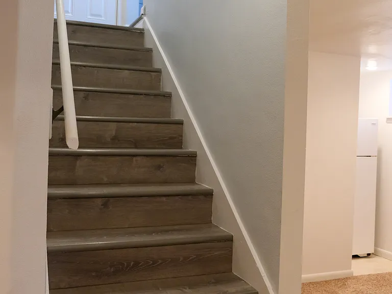 Back entrance and stairs to bedrooms C and D.