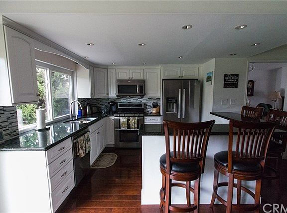 Remodeled and expanded kitchen with breakfast bar