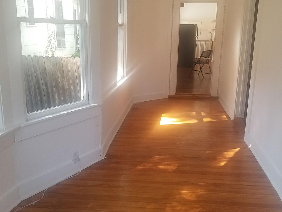 View from front door through LR to K, master BR on right.