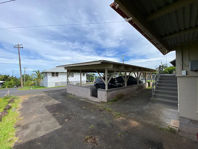 2 covered parking spots in front of the home + driveway!