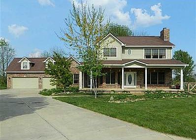 Exterior Front. Great custom-built home at the end of a cul-de-sac, no neighbors behind! In the country, entire  subdivision  has only 15 homes! 3BR also has fin. bsmnt. w/2 more rooms used as BRs. 3.5 BAs. LR, FR, GR rms. Huge front porch, back porch. 1