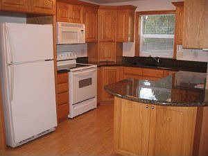 Solid Oak Cab & Granite Counters