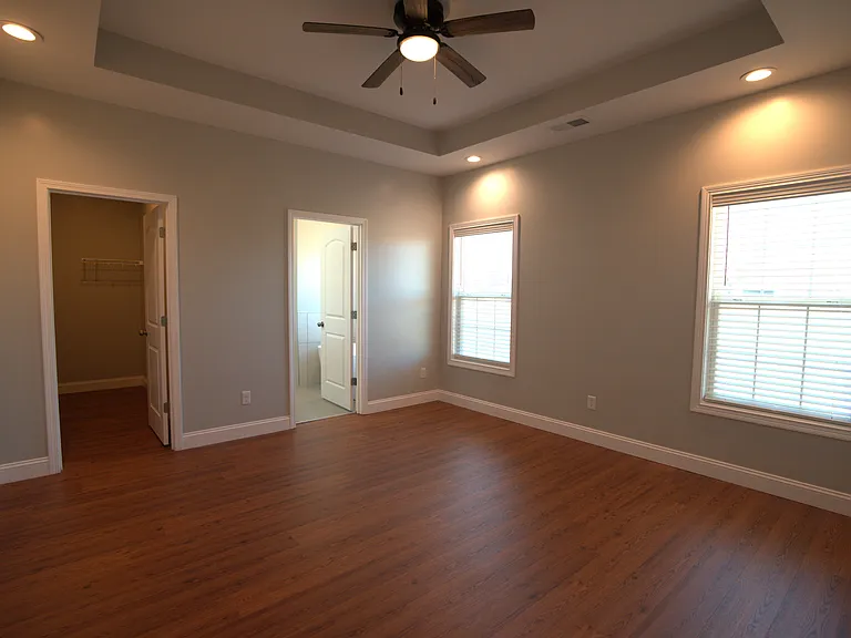 Master bedroom with a large walking closet