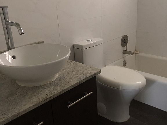  Bathtub. One piece toilet. Modern textures 