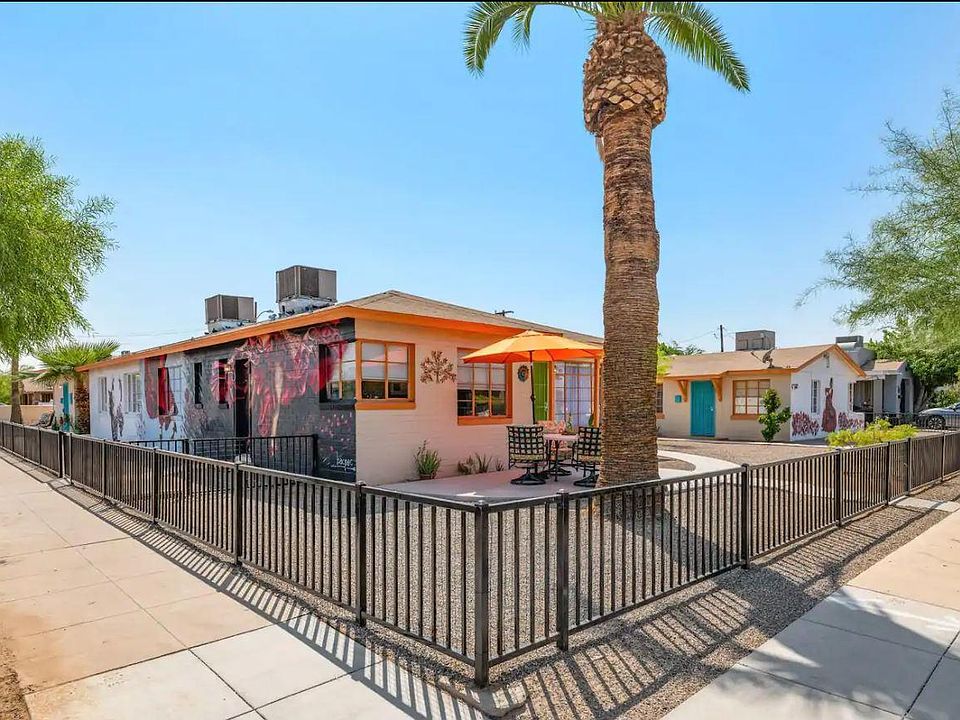 The corner of the complex. 15th street is the street on the Left with bright murals, and Fillmore is on the right. Your building is the far right one with the mural of the dancer in the red dress surrounded by roses. you can see the front door in BLUE