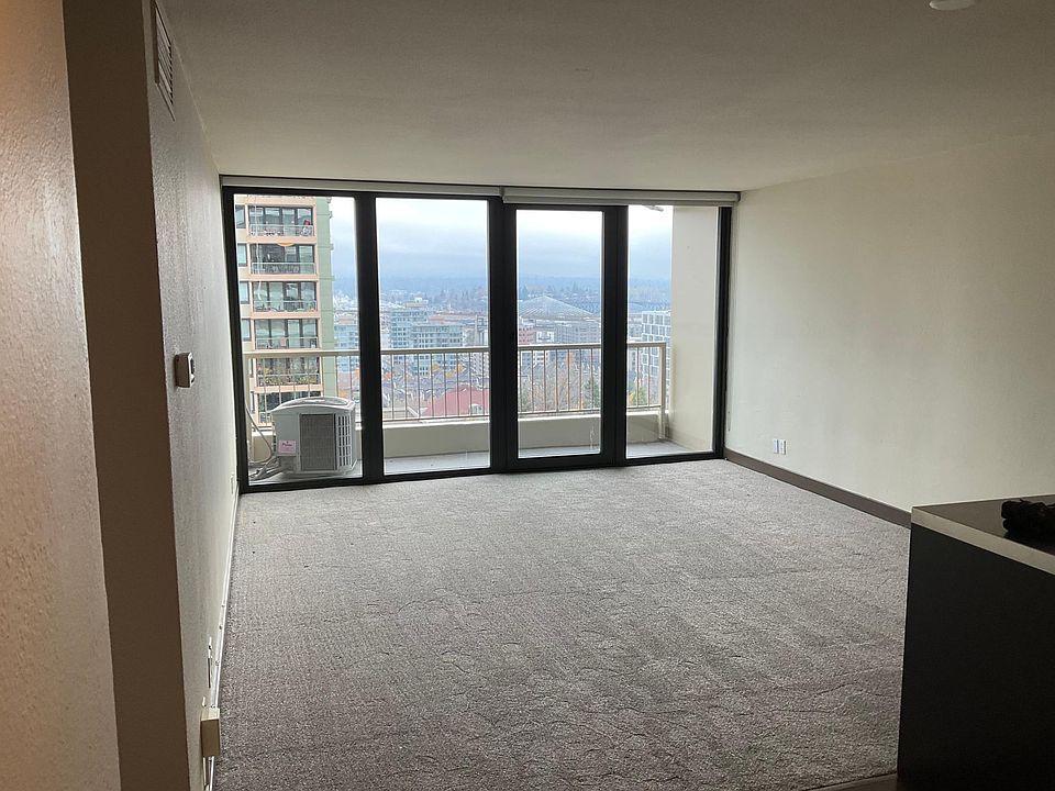 Living room and deck w/view looking East