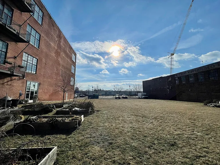 Fenced In Community Yard/Community Garden Boxes/Gated Tenant and Guest Parking