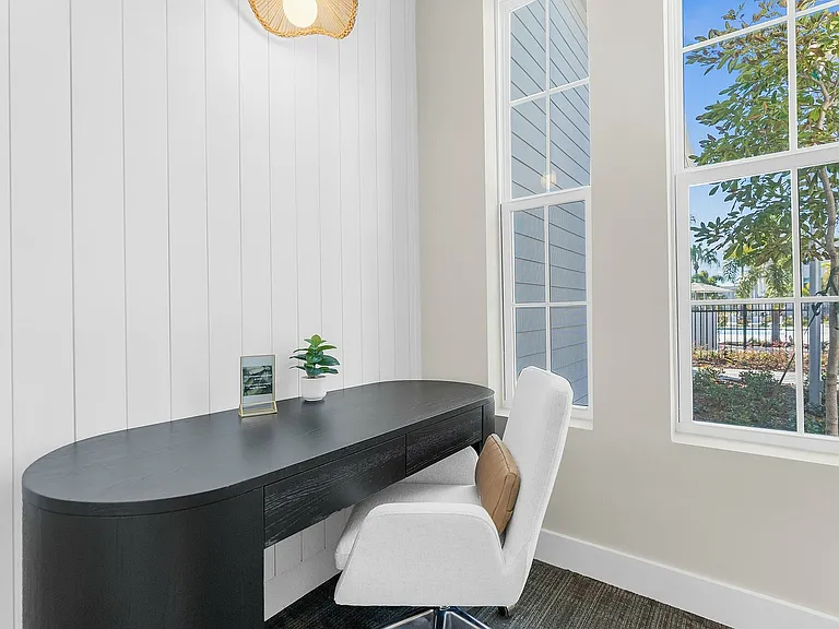 Experience productivity in this stylish and serene home office corner.