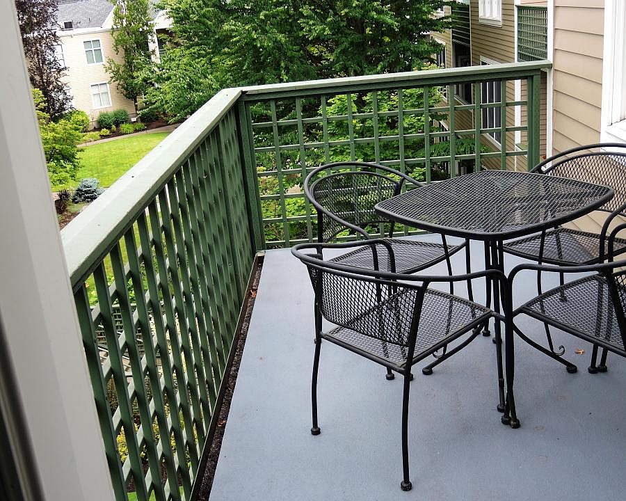 Deck overlooking a landscaped courtyard
