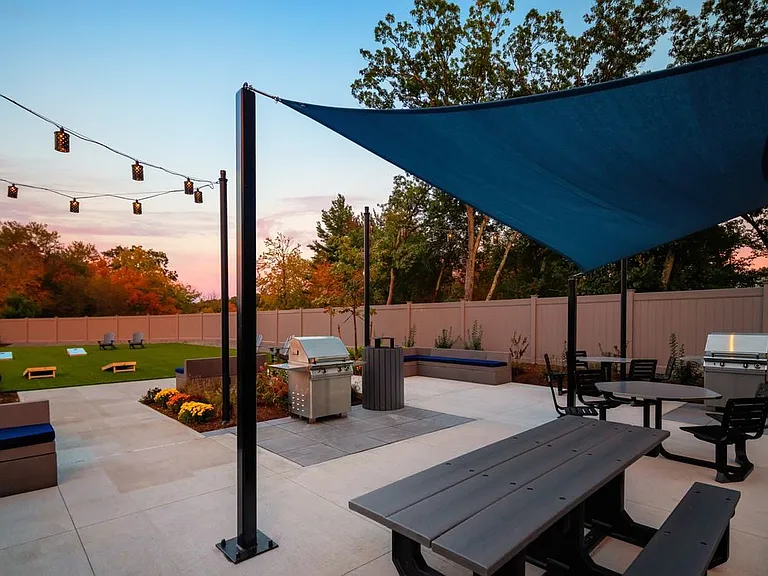 Courtyard with grilling stations and picnic areas