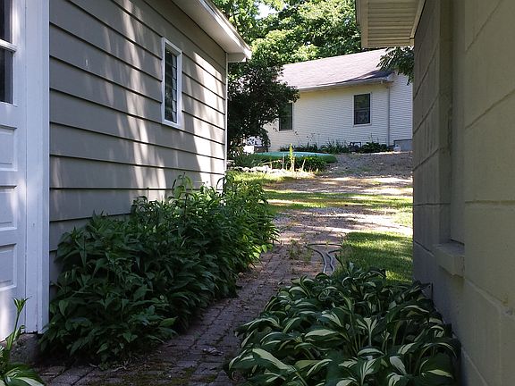 Walkway to Garage and Patio