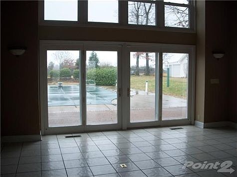 French Doors Leading to Patio, Pool Area & Poolhouse
