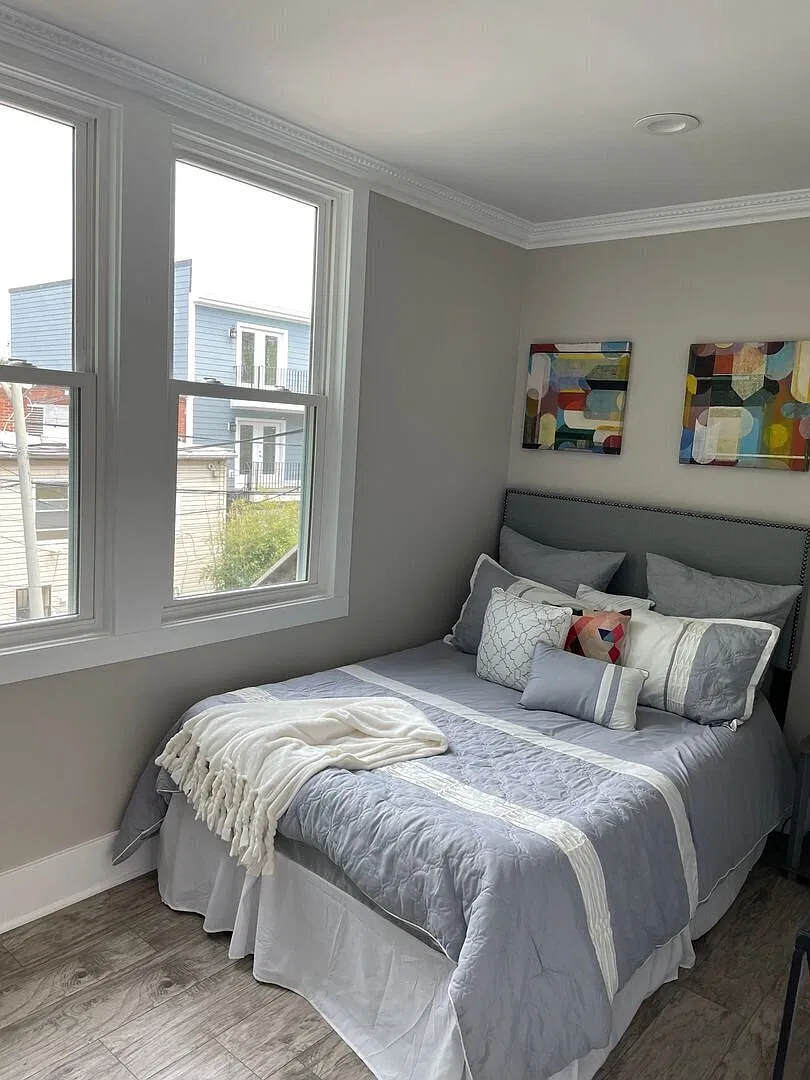 Trendy 2BR Trinidad Condo with Modern Finishes & In-Unit Laundry — Photo 2