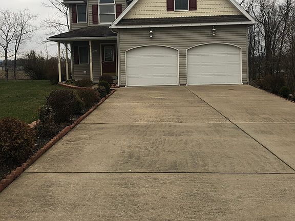 Driveway can hold 6 cars!