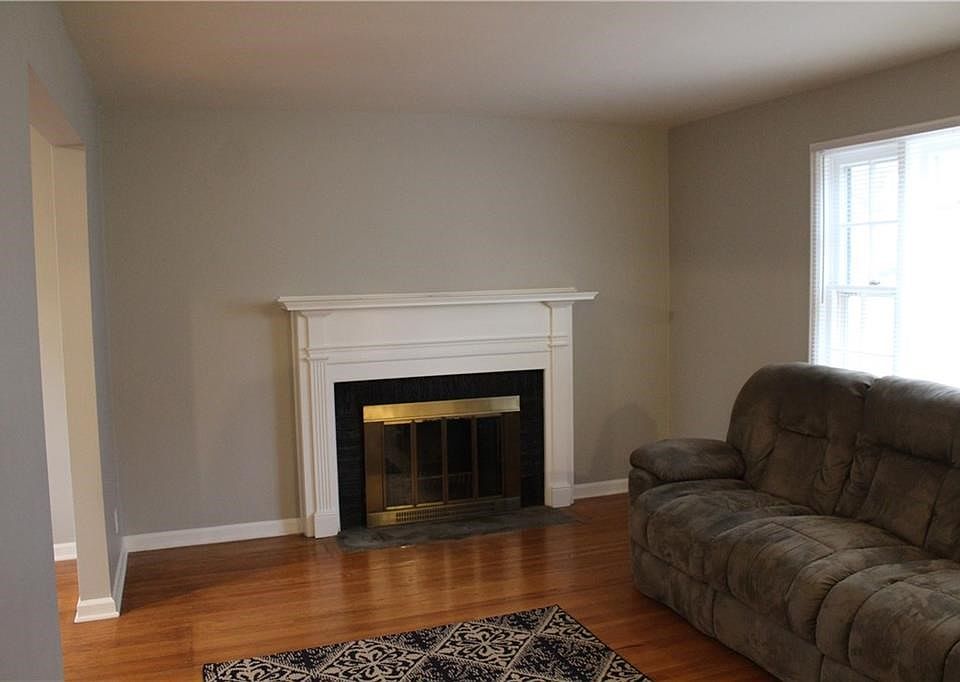 Cozy living room with wood burning fireplace