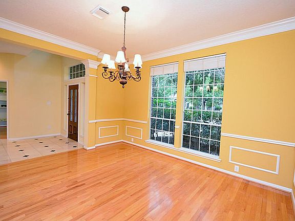 The formal dining room is gorgeous with tons of space and open to the foyer.