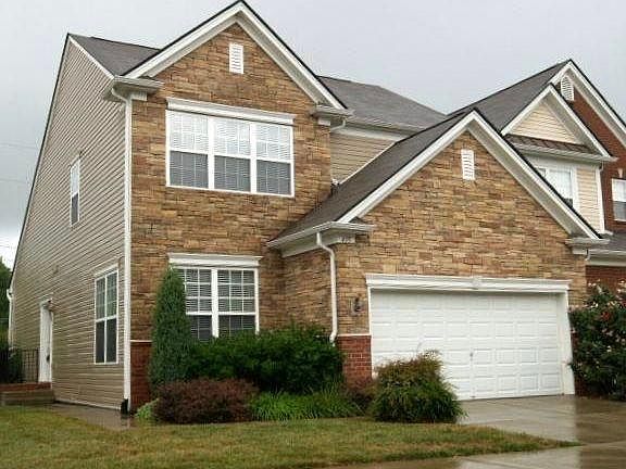 Lovely, 2000 sq foot, 2 floor townhome. Located on the quiet, back row of homes in a gated community, with an upper deck overlooking wooded green space.