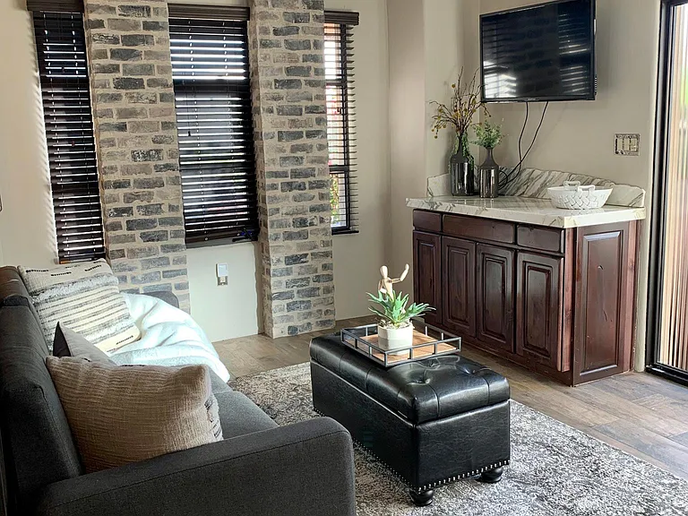 Queen Bed converts to Couch for varied space uses.