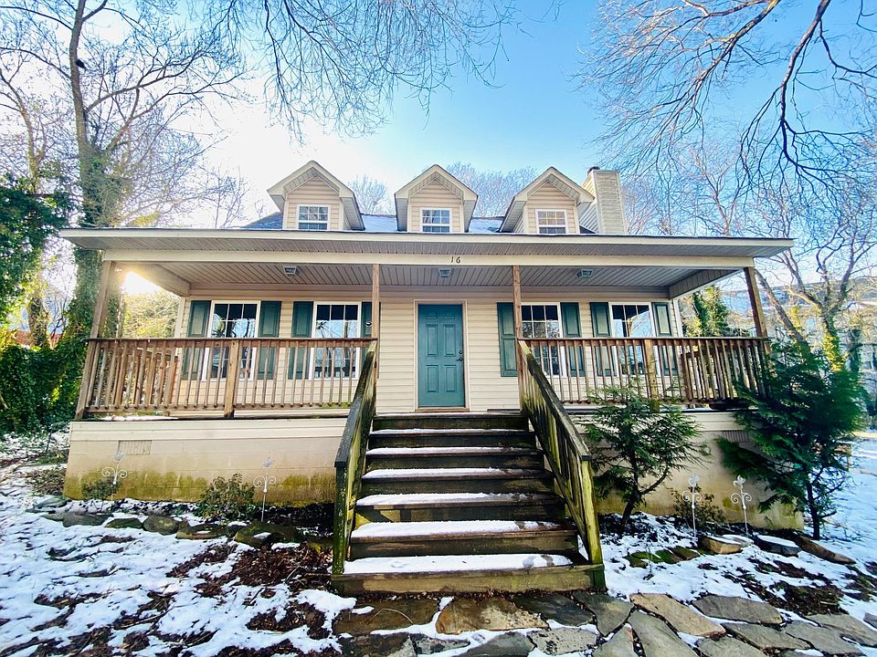 Front house view-spacious deck and many windows looking onto downtown Asheville.