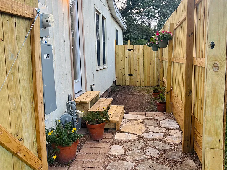 Private gated entrance with fenced yard space. Your own secure retreat just 1 block from TXST!