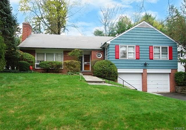 Beautifully set on .34 acres on a quiet street.