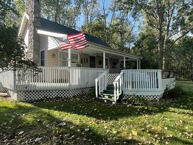 House with wrap around deck