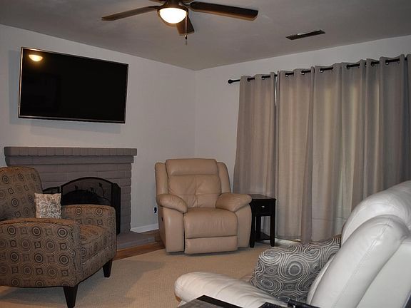 Living Room with Wood Burning Fireplace