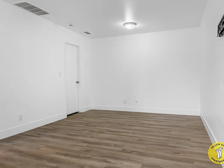 YELLOW DOOR APARTMENTS — Photo 7