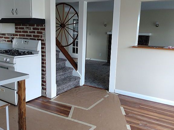 DR/Kitchen new lam. floors