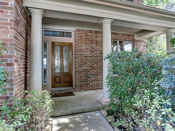The large front porch is a great spot for visiting with friends and neighbors. Imagine a few rocking chairs out here. The privacy that the cul de sac location allows is perfect for visiting.