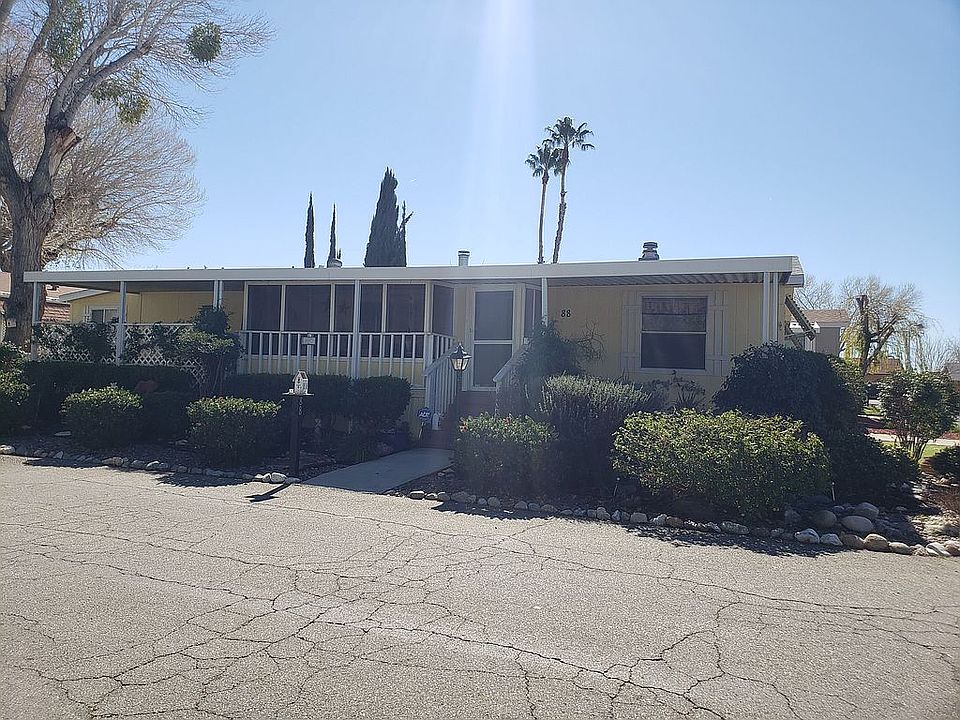 Front view. Large corner lot