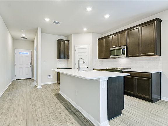 Cook your favorite meal in this spacious kitchen.