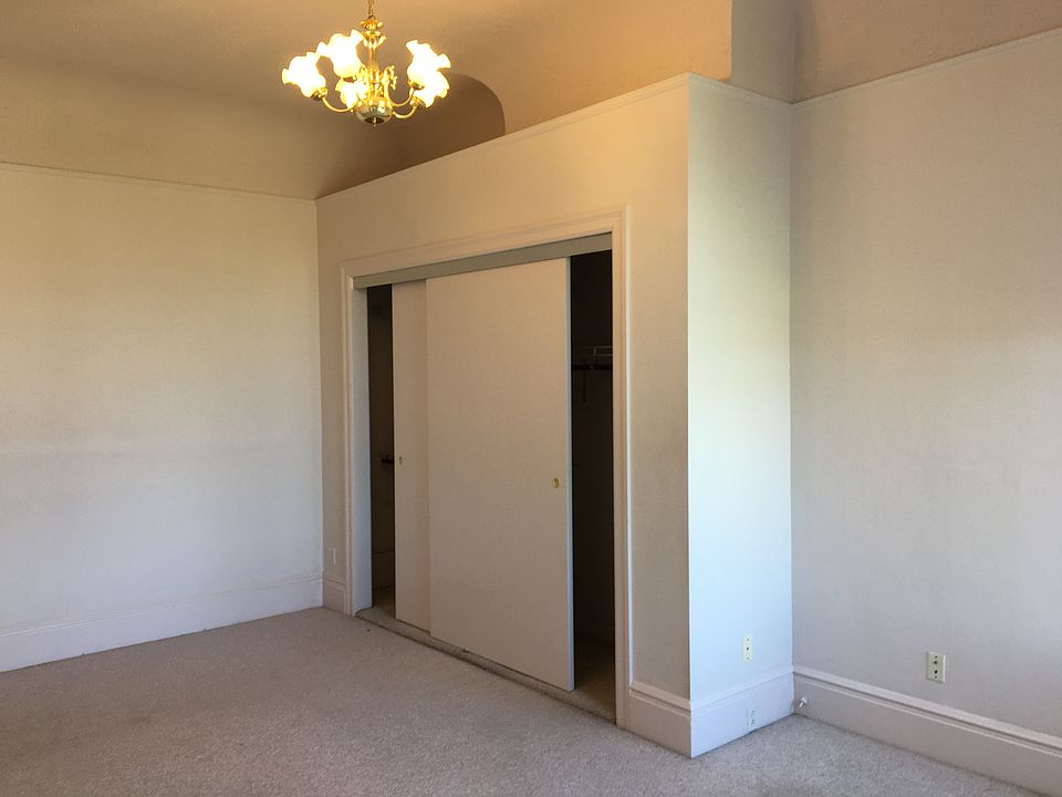 Triple closet in bedroom