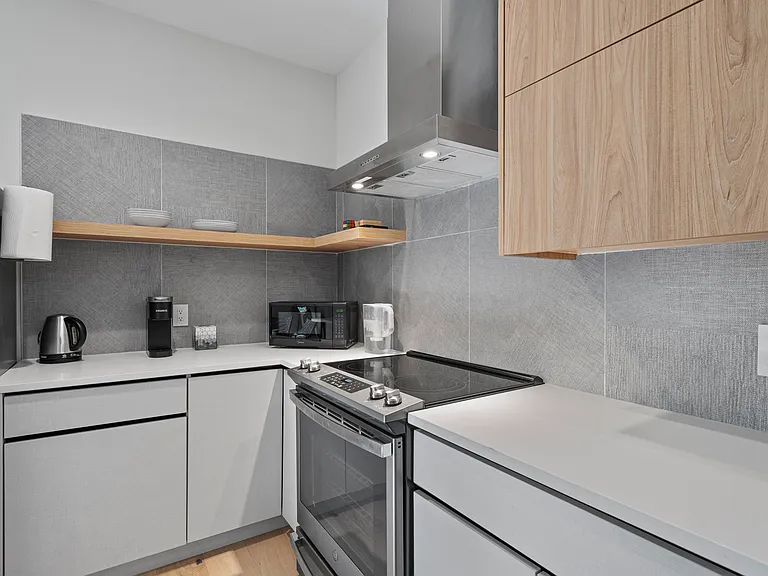 Electric cooktop and an oven/airfryer.