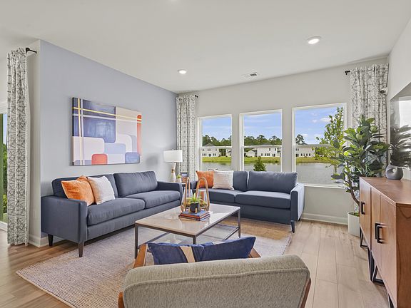 Enjoy family nights in the spacious great room. Photography from Clear Pond in Myrtle Beach, SC