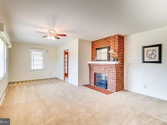 Spacious Family Room with Wood Burning Fireplace