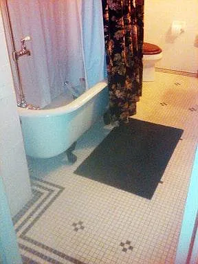 Original claw tub with large bathroom