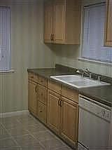 My Kitchen has new Tile Floors, counters and Fresh Paint Throughout.