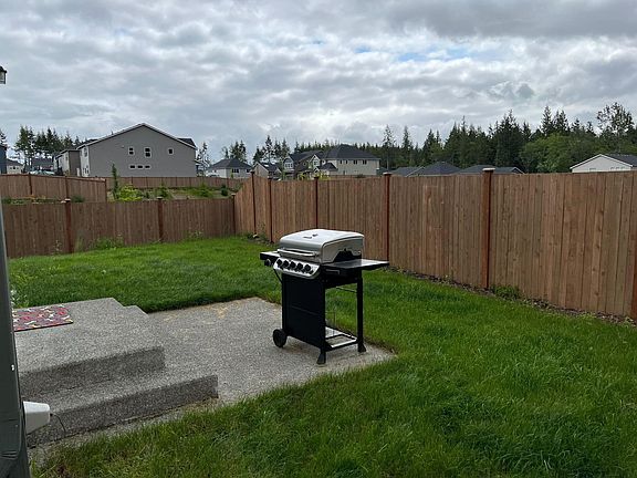 Fenced in backyard with Mt Rainier views