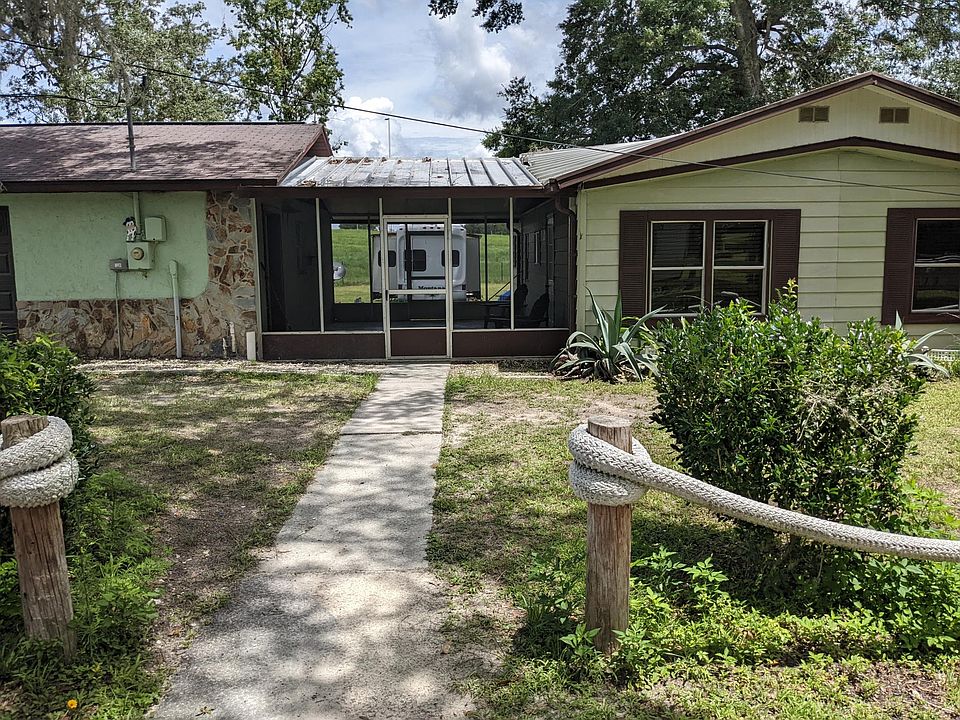 front, garage to left of entry, home to right