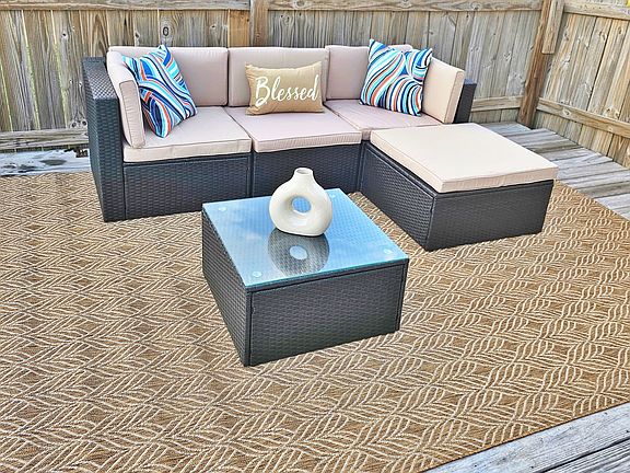 Large deck located right off the main bedroom