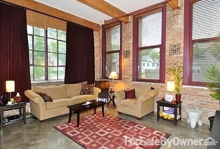 Large open concept living room
						:
						Large west and north facing windows, polished concrete floors, 15ft ceilings