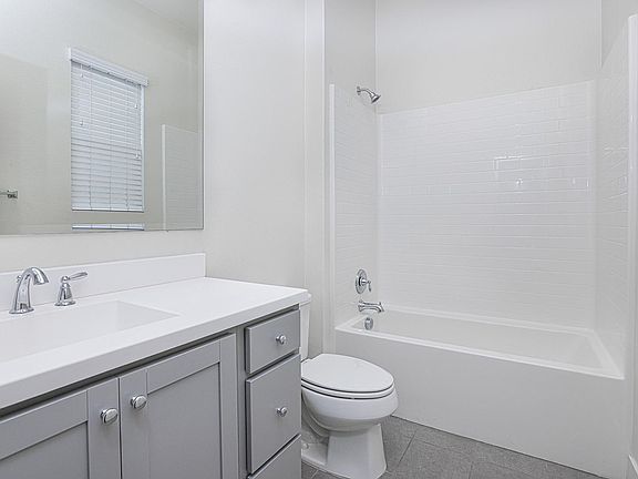 Full bath inside bedroom #2 on first floor.
