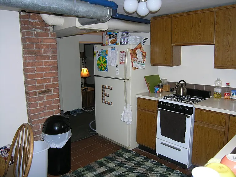 Kitchen looking into living room