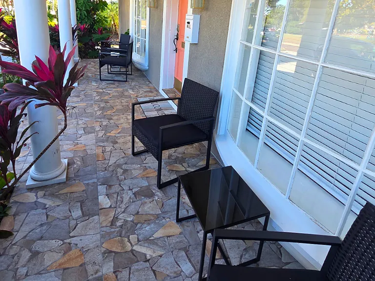 Beautiful entry decor with stylish accents and a welcoming mat.