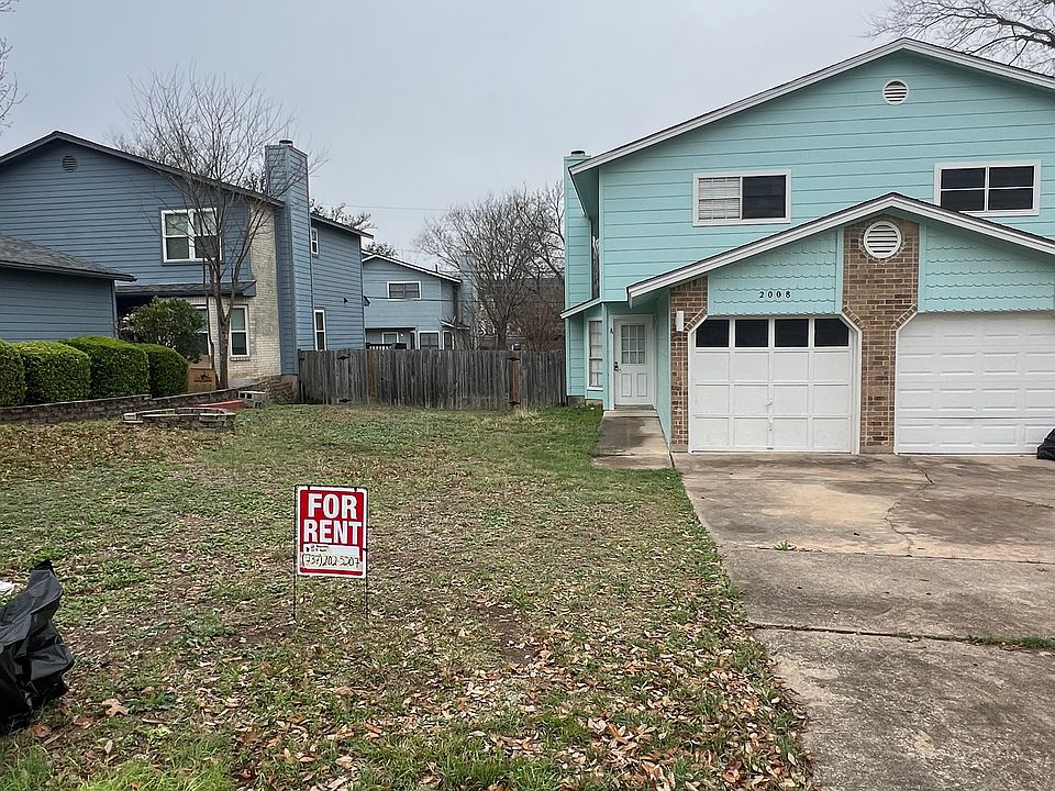 Front view of Duplex
Unit A is located on the left side of the home. 
Front yard and 2-car driveway parking available. 
Additionally, there is a one car garage with a sliding door.