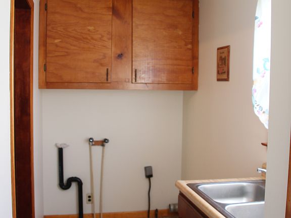 Laundry Area with closet and extra sink