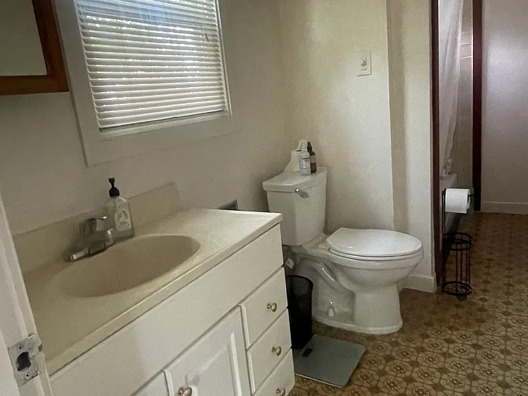 Bathroom with tub and shower