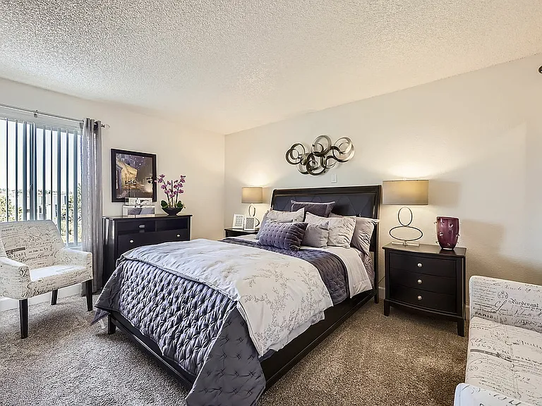 Experience tranquility in this elegantly designed bedroom, perfect for restful nights.