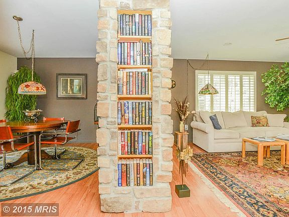 Double fireplace with built in Book Case